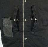Inside pockets of Daniel Smart Mfg. black denim motorcycle vest