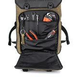 Tools being carried in pockets of Kriega Roland Sands Design Roam 34 motorcycle backpack