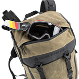 Goggles in exterior pocket of Kriega Roland Sands Design Roam 34 motorcycle backpack